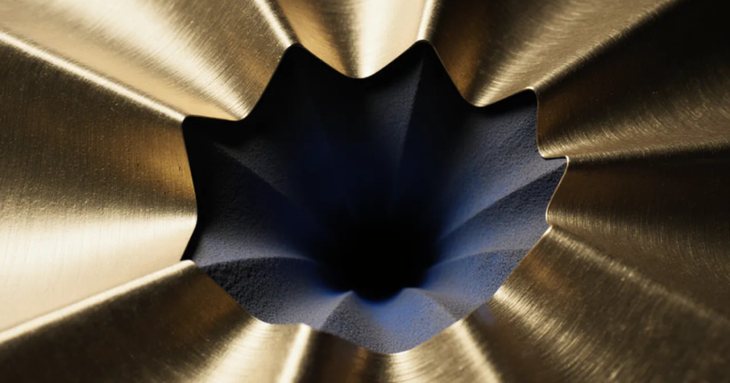 Featured image for "Credit Mailer Changed Terms Without Notice": Brass panels fold inward around a dark glowing indigo core